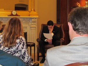 House Speaker Paul Ryan (R-WI) studying the NASBA EAS/IPAWS white paper during NAB SLC.